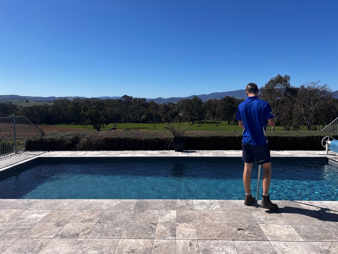 Total Pool Services technician at work